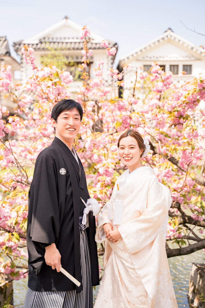 岡山・倉敷前撮りフォトウェディングカメラマン宗村和磨NEMURA FILMS岡山後楽園や倉敷美観地区や吉備津神社での河津桜と撮影する結婚式写真ブライダルフォト開花から20日後倉敷美観地区